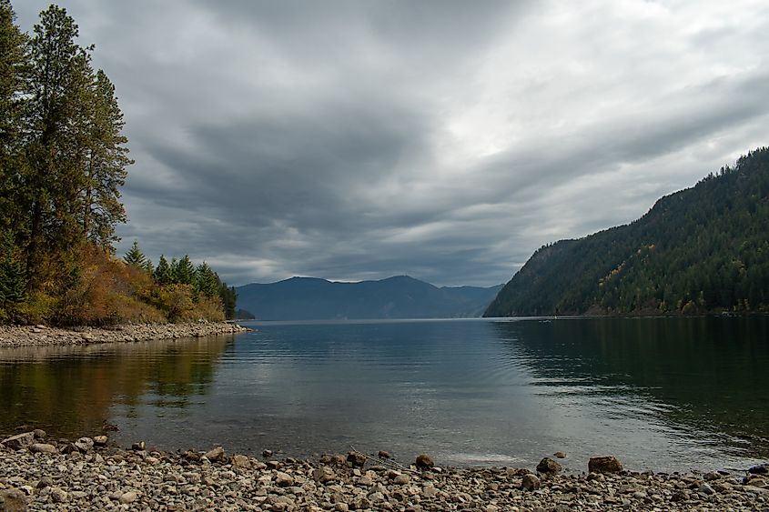 Lakeside view of the distant mountain and surrounding trees at Farragut State Park