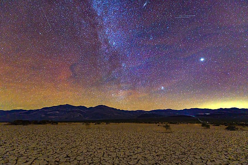View of the Milky Way over the desert and mountains at Death Valley National Park