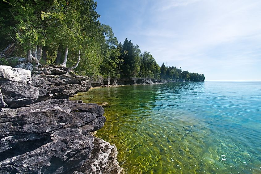 View of the the rocky limestone cliffs along the Lake Michigan coastline